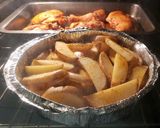 Foto del paso 5 de la receta: Pollo con patatas al horno