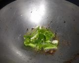 A picture of step 3 of Dessicated coconut rice.