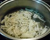A picture of step 2 of My Family's Staple Dish Enoki Mushroom Miso Soup.