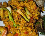 Foto del paso 10 de la receta: Arroz Maty, con alcachofas confitadas, ajos tiernos, gambas langostineras y sepia