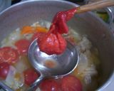 A picture of step 4 of Pork and Sugar Tomato Fruit Curry.
