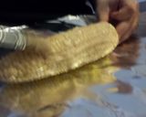 A picture of step 3 of Rob's creole oven roasted corn.