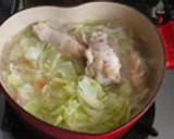 A picture of step 2 of Curry Consomme Soup with Chicken Wings and Cabbage.