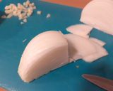 Foto del paso 5 de la receta: Calabacín relleno con cebolla y mijo