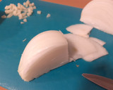 Foto del paso 5 de la receta: Calabacín relleno con cebolla y mijo