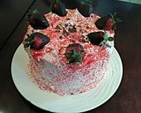 A picture of step 19 of Fresh Strawberry Chiffon Layer Cake with Chocolate and Strawberry Whipped cream.