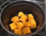 A picture of step 2 of Simmered Kabocha Squash in a Staub Cocotte.
