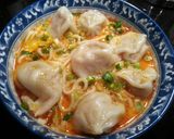 A picture of step 6 of Asian Curry Noodle Dumpling Soup.