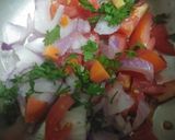 A picture of step 4 of Onian tomato carrot salad.