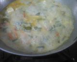 A picture of step 5 of Rosgolla naboratan korma.