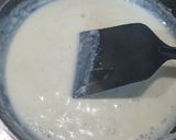 A picture of step 9 of Spinach Corn Ravioli in white sauce.