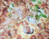 A picture of step 3 of Chicken tikka pizza.