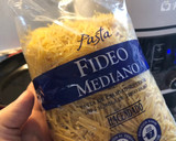 Foto del paso 6 de la receta: Fideuá melosa de pollo con pimientos