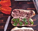 A picture of step 2 of Goat's cheese, red capsicum and olive tapenade sandwich.