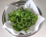 A picture of step 1 of Pan-Fried Bitter Melon and Pork with Miso.