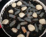 Foto del paso 8 de la receta Fideuá negra con pulpo y alioli de pimentón