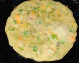 A picture of step 3 of Protein packed Moong and masoor dal Chilla.