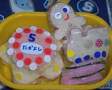 A picture of step 9 of Kindergarten Bento (Flying Carp Sandwiches).