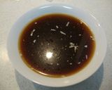 A picture of step 1 of Rice with Maitake Mushrooms Seasoned with Simmered Pork Belly Sauce.