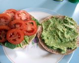 A picture of step 3 of skye's guacamole sandwich.