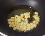 A picture of step 1 of Tangy Tomato Coconut and Mixed Veggies Poha.