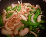 A picture of step 3 of Sweet Onion and Snow Peas with Fluffy Scrambled Eggs.