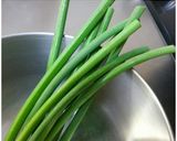 A picture of step 5 of Garlic Shoot Bokkeum (Korean-Style Sauté Dish).