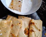 A picture of step 3 of Papad roll stuffed with green coriander and dry coconut.