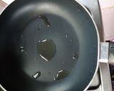 A picture of step 2 of Beans on scrambled egg on toast.