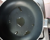 A picture of step 2 of Beans on scrambled egg on toast.