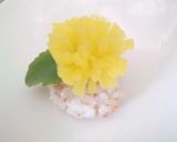 A picture of step 4 of Radish Dandelion Sushi Balls For Doll Festival or Mother's Day.