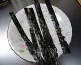 A picture of step 4 of Spam Musubi.