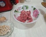 صورة لخطوة 4 من وصفة مثوم بصلصه حمراء