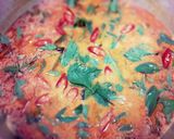 A picture of step 6 of Thai Chicken Red Curry.