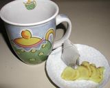 A picture of step 1 of Hot Honey Ginger Tea.