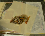 A picture of step 5 of Authentic Spring Rolls with lots of Veggies.