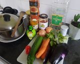 A picture of step 1 of Zucchini & aubergine curry.