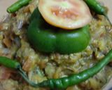 A picture of step 1 of Brinjal Bharta.