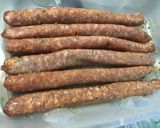 Une image de l'étape 4 de Maxi chipolatas marinées grillées ail et romarin.