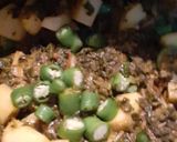 A picture of step 3 of Alu meethi (fenugreek leaves).