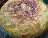 A picture of step 6 of Spanish Potato Omelette with Caramelized Onions.