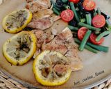 Foto del paso 7 de la receta: Contramuslos de pollo al limón y tomillo