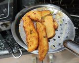 A picture of step 3 of Potato wedges.