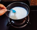 A picture of step 2 of Homemade Condensed Milk.