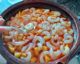 Foto del paso 9 de la receta Gambas al fish masala con patatas confitadas en fumet de gambas