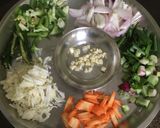 A picture of step 1 of Burnt Garlic Veg Fried Rice.