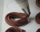 A picture of step 6 of Christmas Wreath Cookies [Chocolate Spritz].