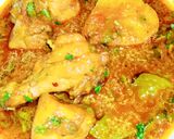 A picture of step 4 of Chicken Aloo Curry.