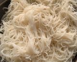 A picture of step 3 of 3 layered rice vermicelli in coconut milk sauce.