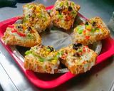 A picture of step 4 of Cheese garlic toast with  vegetables recipe  on tawa.
